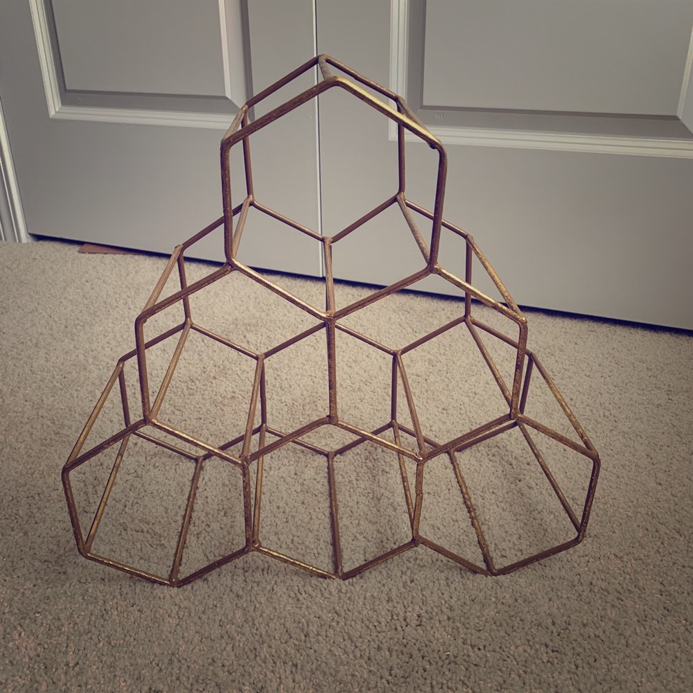 Gold wine rack